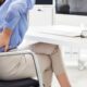 Osteopath explaining why nerve pain happens during WFH but not office work